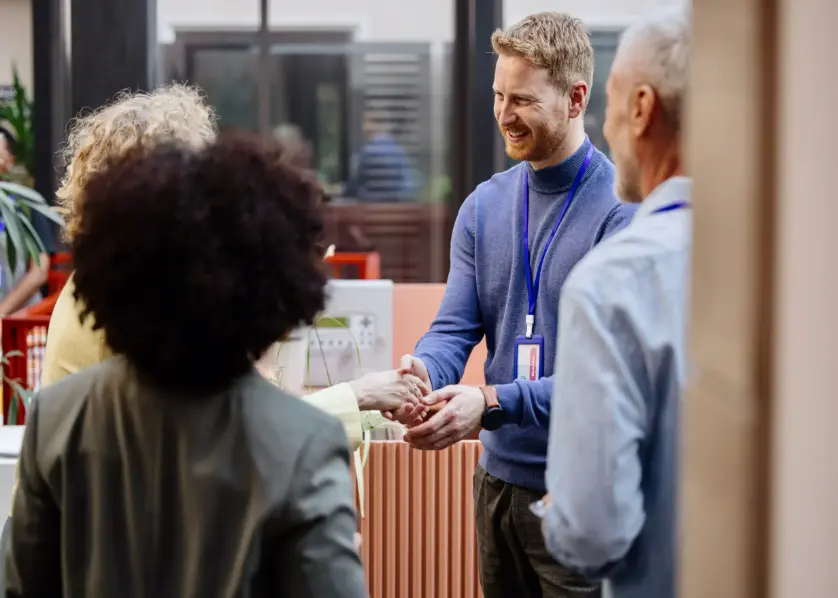 Sales team at a conference booth